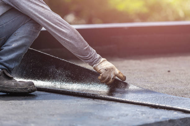 Professional Basement Waterproofing technician working in Lillian, AL